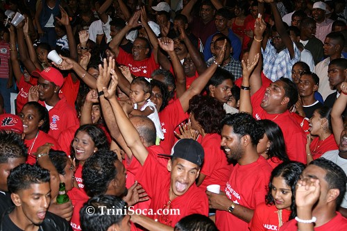 Malick All Stars supporters in red enjoy the Malick All Stars Tassa Group