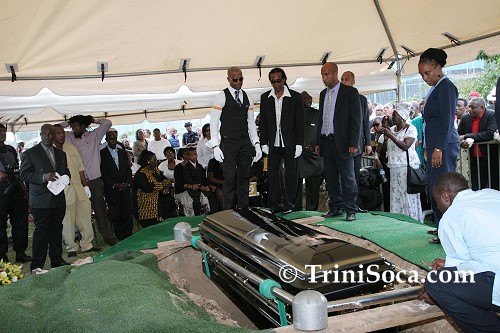Duke's coffin being lowered into the grave