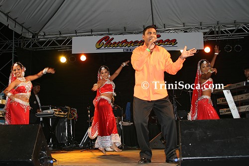 Rooplal Girdharrie and dancers on stage