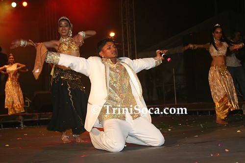 Rick Ramoutar and dancers on stage