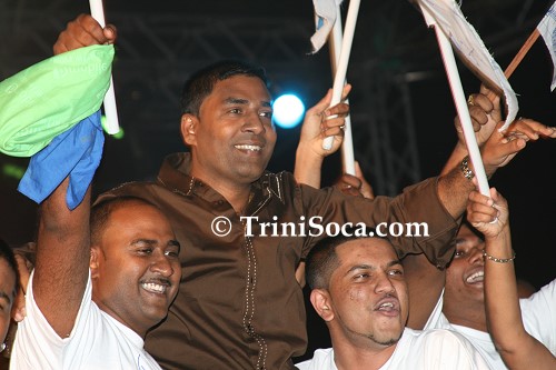 Double winner Rooplal Girdharrie being hoisted by his supporters