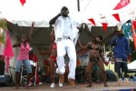 Cleave 'Zion Child' Joseph performing on stage with his carnival section 'Colours'