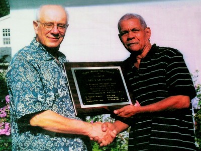 Mr. Gomez being honoured at Connecticut University